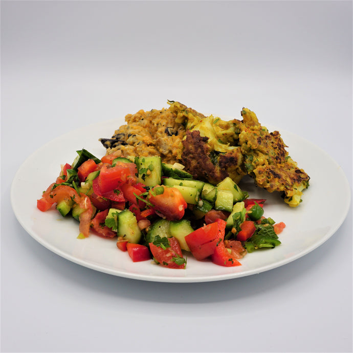 Shish spiced cauliflower fritters, butternut squash and aubergine, served with a crunchy fresh salad with lemon juice