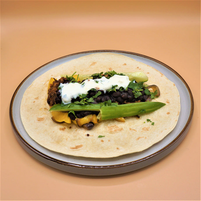 Jerk jackfruit, sweet yellow pepper & black bean wrap