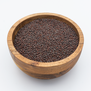Black mustard seeds in bowl