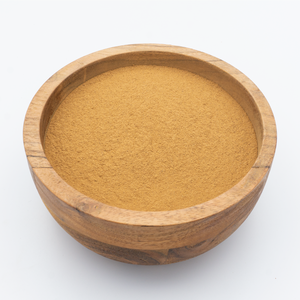 Ground cinnamon in bowl