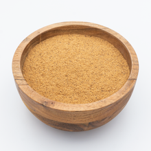 Load image into Gallery viewer, Ground nutmeg in bowl